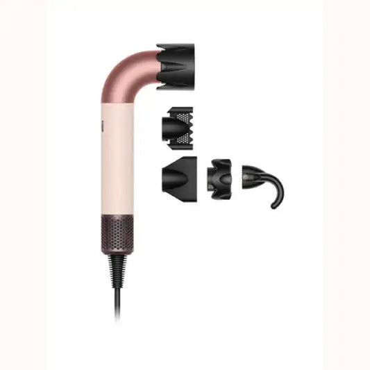 Asciugacapelli Dyson rosa con accessori per diverse modalità di styling e flusso d'aria