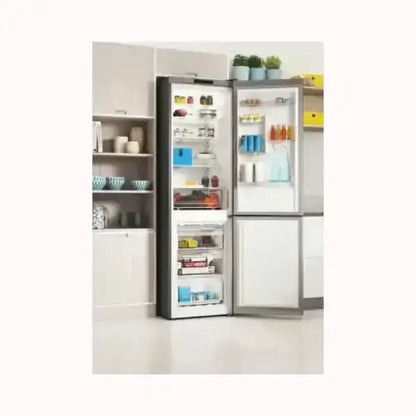 Frigorifero INDESIT con doppia porta aperta pieno di alimenti in una cucina moderna bianca