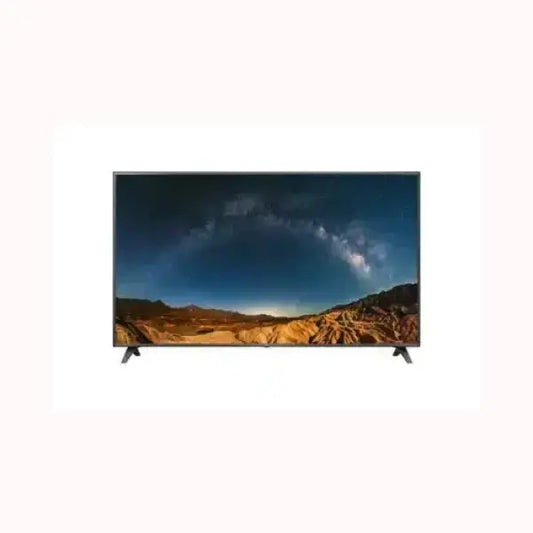 LG TV televisore a schermo piatto con cornice nera e piedini a V che mostra un paesaggio notturno e montagne