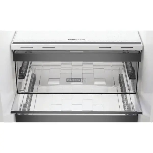 Cassetto interno trasparente di frigorifero Whirlpool per conservare alimenti freschi