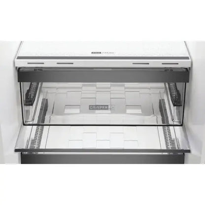 Cassetto interno trasparente di frigorifero Whirlpool per conservare alimenti freschi