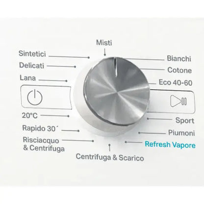 Dettaglio manopola con programmi di lavaggio della lavatrice Whirlpool in acciaio e bianco